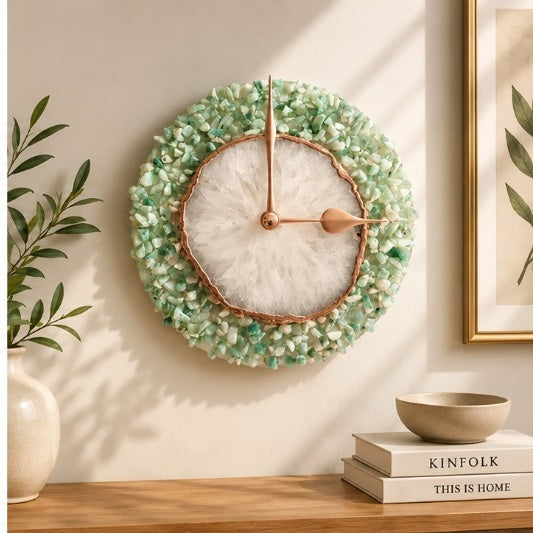 Light green crystal agate wall clock on a warm wall beside a framed print and books