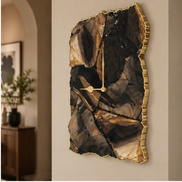 Picture jasper wall clock on a warm wall beside a framed print and a plant