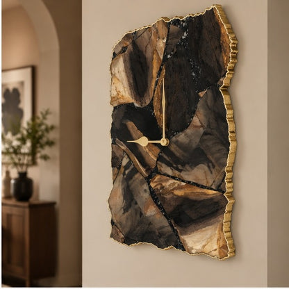Picture jasper wall clock on a warm wall beside a framed print and a plant