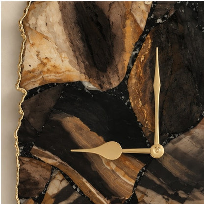 Close view of the picture jasper banding, its gold organic edge and gold hands