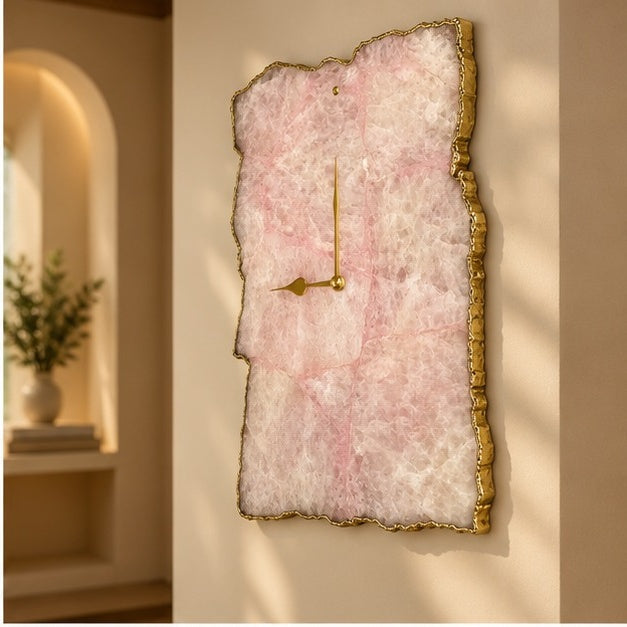 Rose quartz agate wall clock in an arched alcove