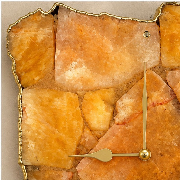 Close view of the amber agate panels and the gold hands