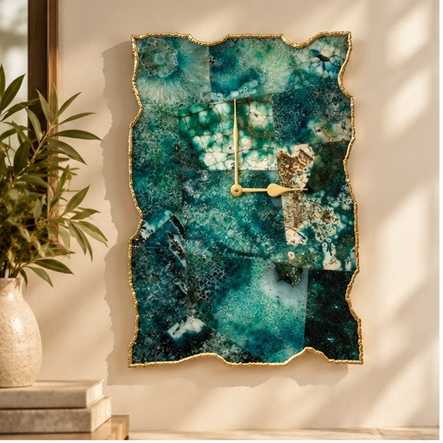 Composite green agate wall clock on a warm wall beside a plant