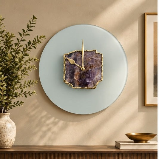 Frosted glass amethyst wall clock with gold hands and a gold edged slab