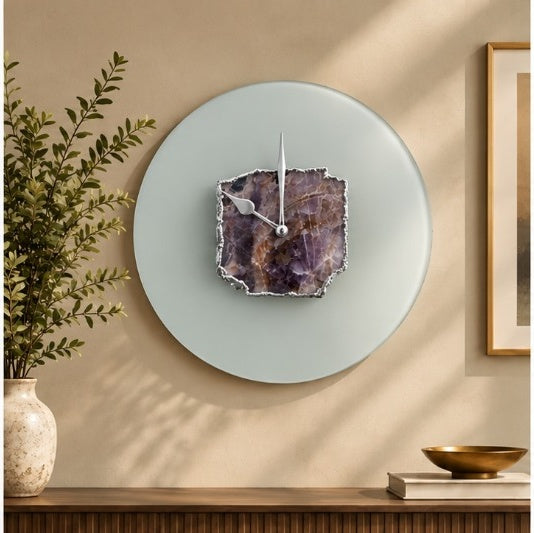 Frosted glass amethyst wall clock with silver hands and a silver edged slab