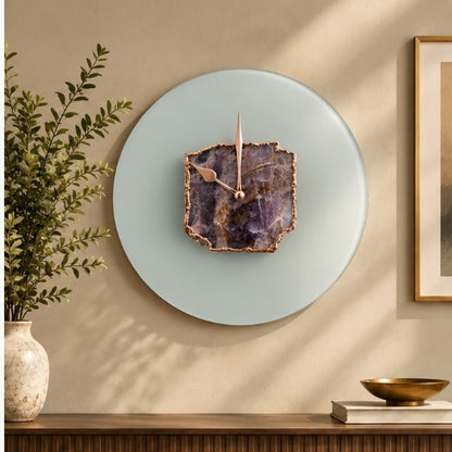 Frosted glass amethyst wall clock with rose gold hands and a rose gold edged slab