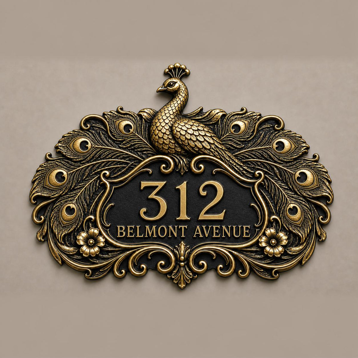 Peacock plaque in antique brass, front view showing the raised design and lettering
