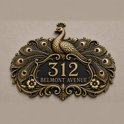 Peacock plaque in antique brass, front view showing the raised design and lettering