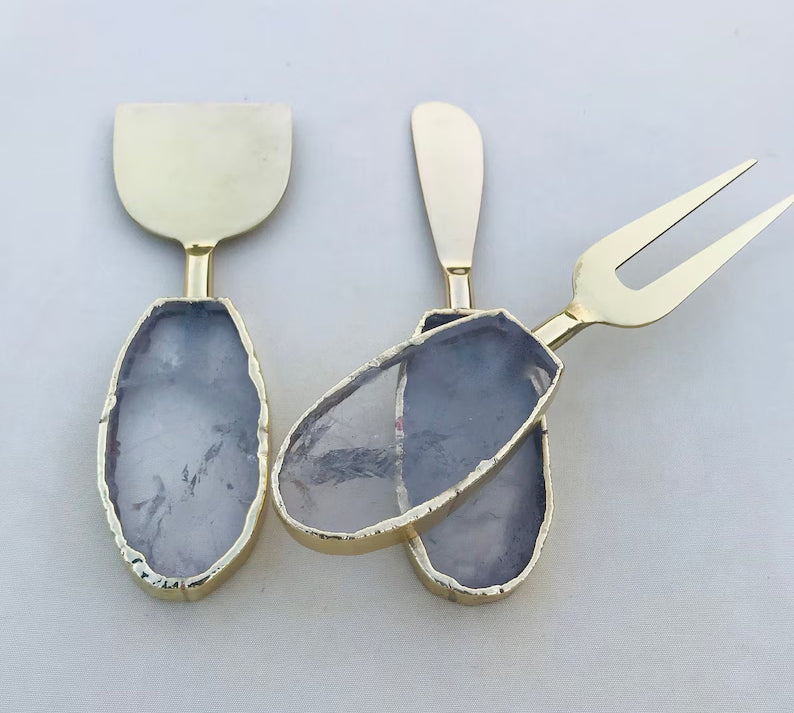 Clear Quartz Oval Cheese Board Set – close up of quartz handles, electroformed edges
