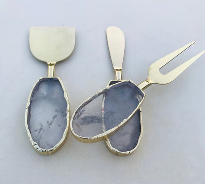 Clear Quartz Oval Cheese Board Set – close up of quartz handles, electroformed edges