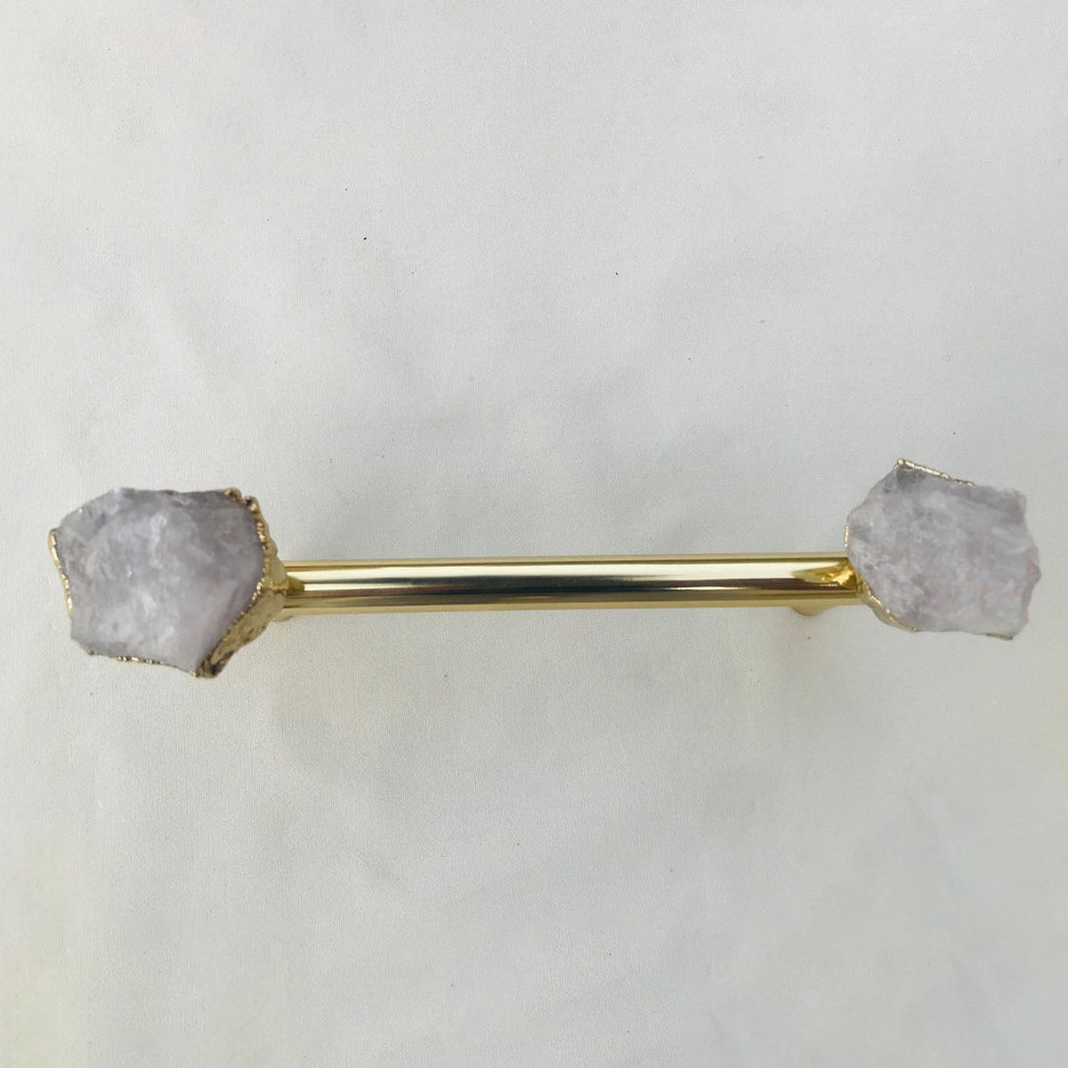 Gold bar pull straight on, cloudy white crystal ends on white
