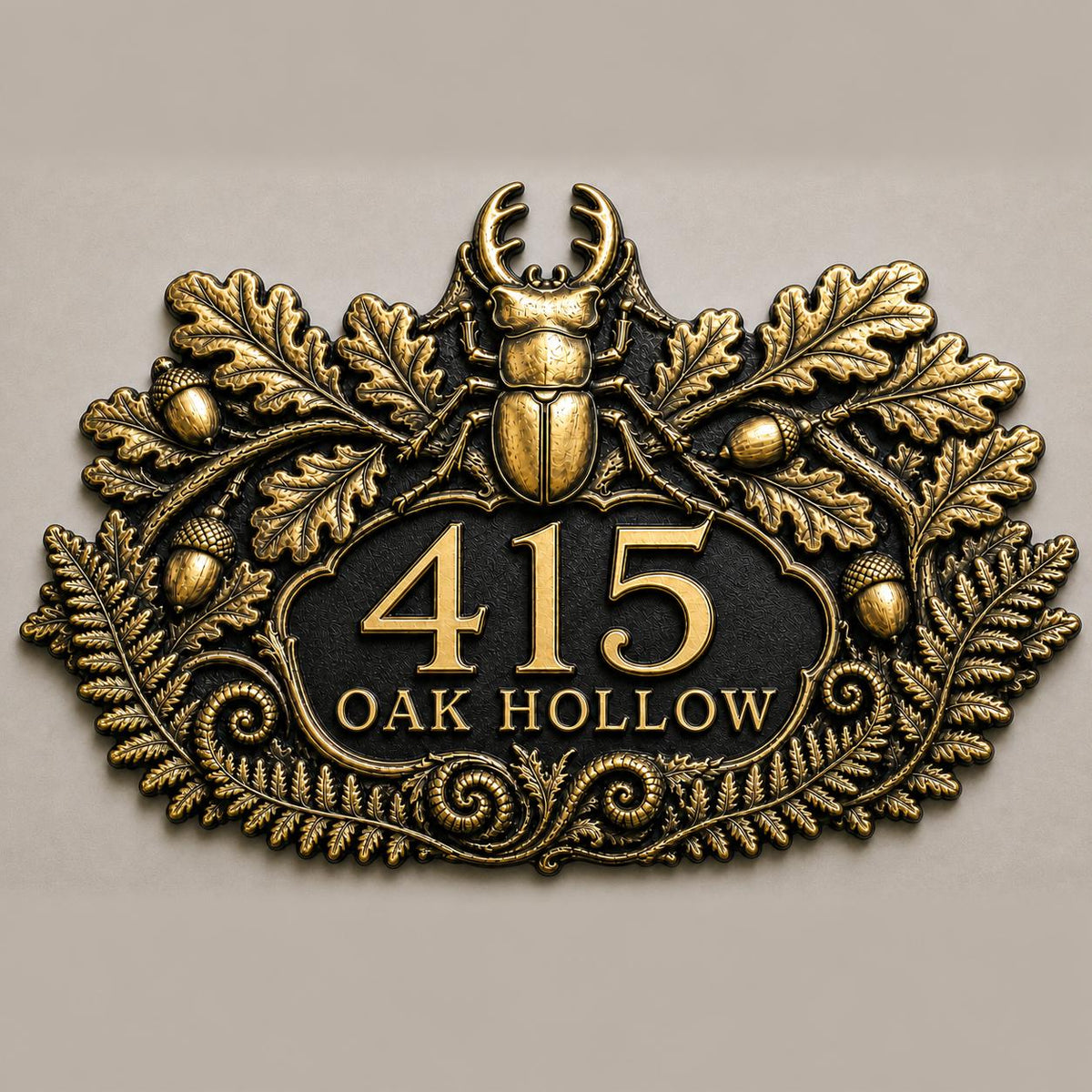 Stag Beetle and Oak plaque in antique brass, front view showing the raised design and lettering