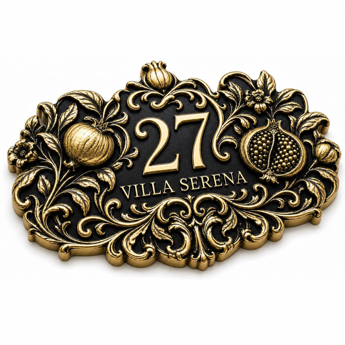 Pomegranate plaque in antique brass, angled view showing the relief, outline and lettering