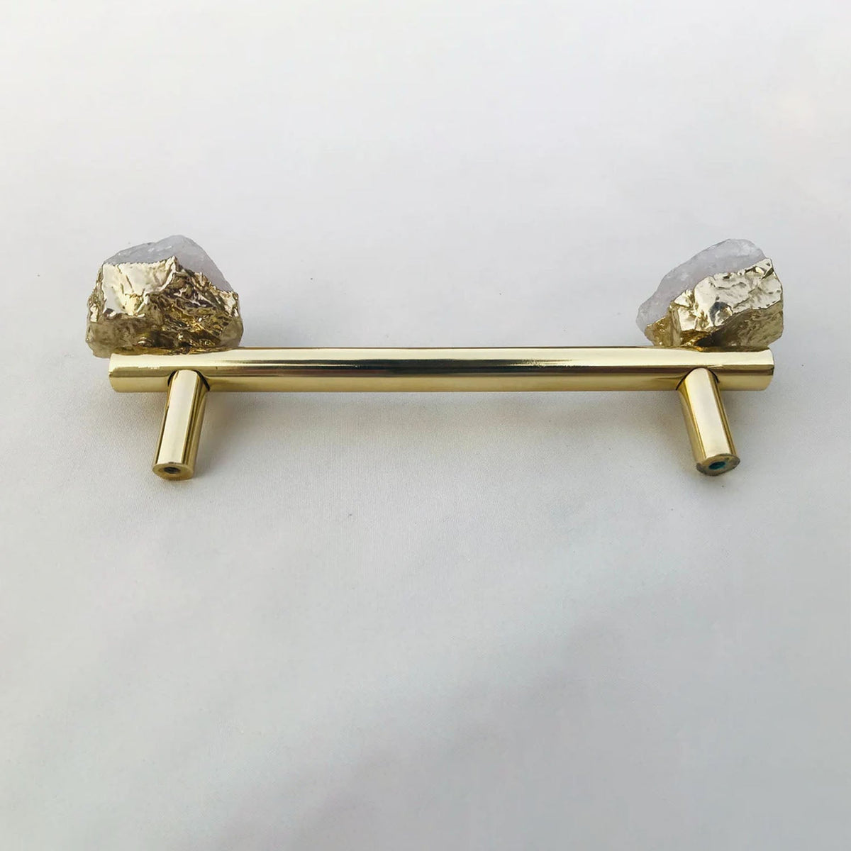 Gold bar pull with pale quartz crystals set in gold at each end