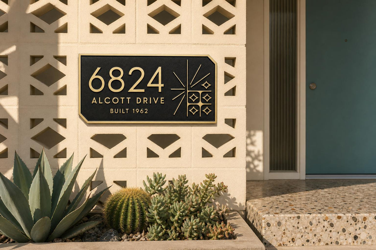 Mid-Century Modern name plate pictured beside a geometric screen and green entrance