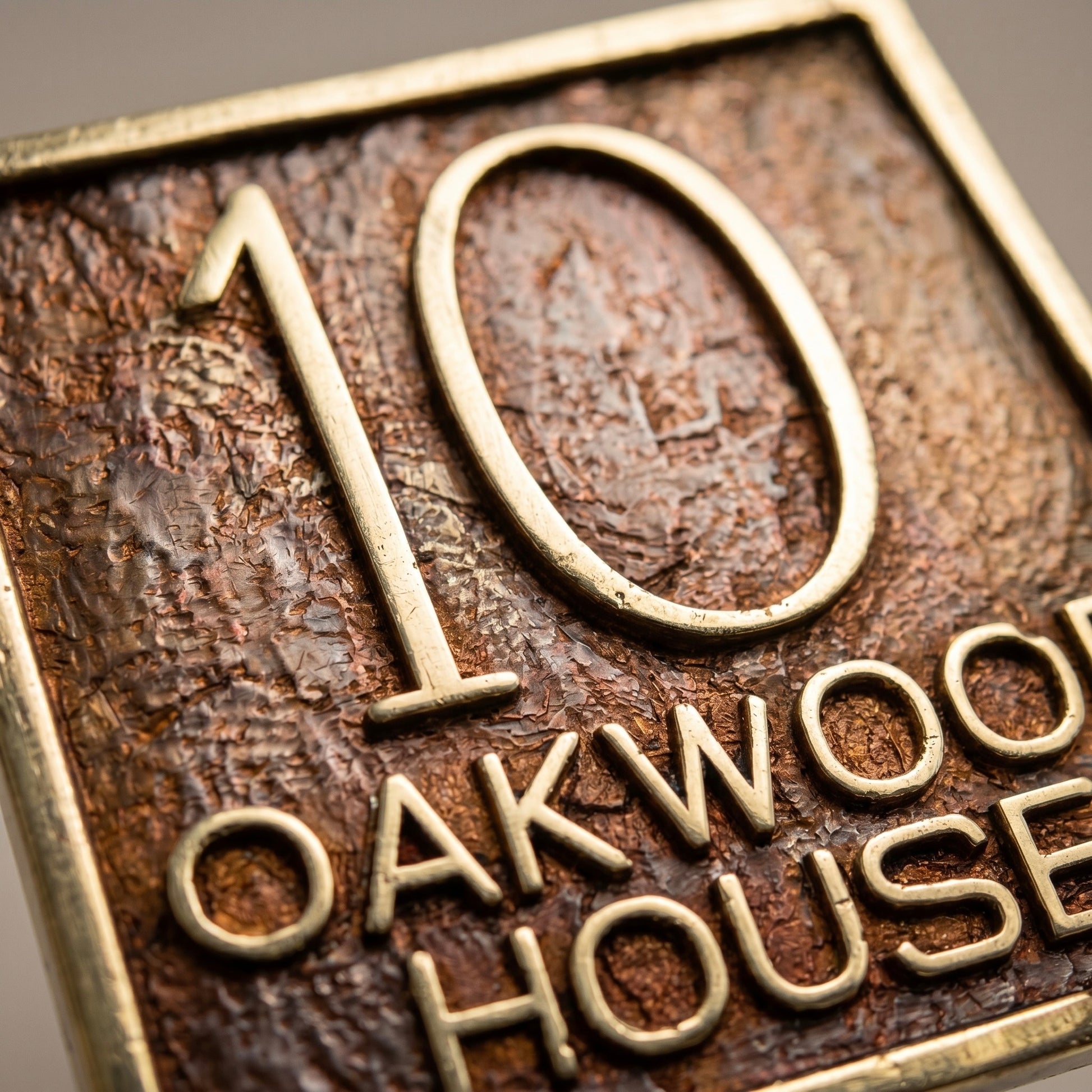 House Number Plaque | Handcrafted stone-effect brass detail