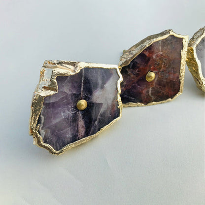 Two slices angled, pale lilac beside a darker rust purple face