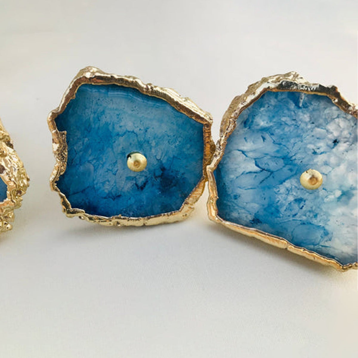 Two slices together, one solid blue and one with a white crystal burst