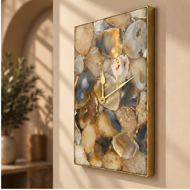 Brown crystal agate wall clock in an arched alcove beside a plant