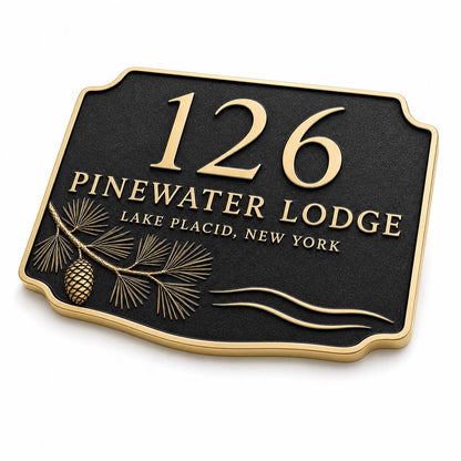 Angled Pine Bough and Cone plaque showing raised lettering and botanical relief