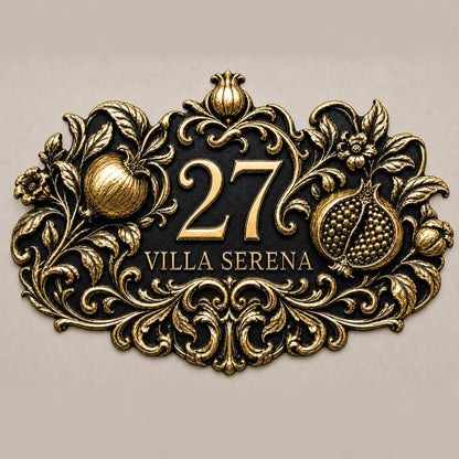Pomegranate plaque in antique brass, front view showing the raised design and lettering